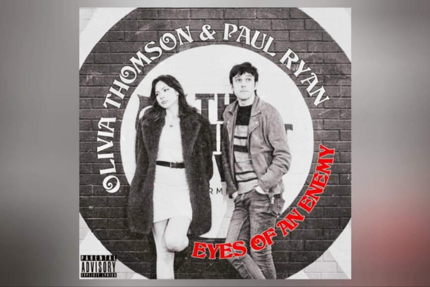 "Eyes Of An Enemy" - Paul Ryan & Olivia Thomson